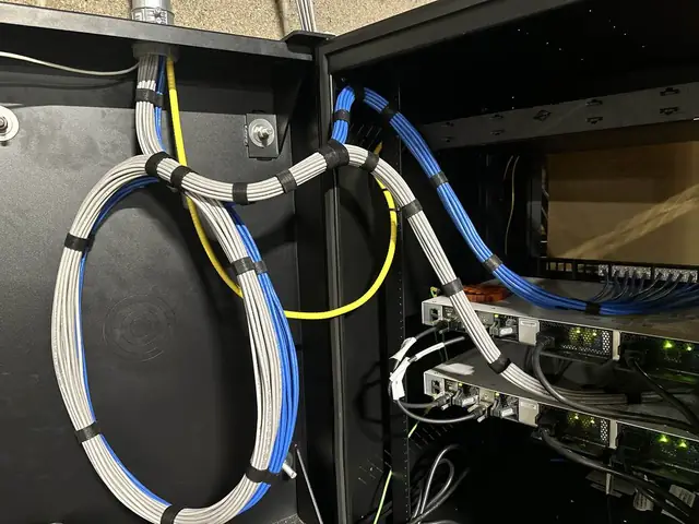 Cisco switches with cable service loops inside cabinet