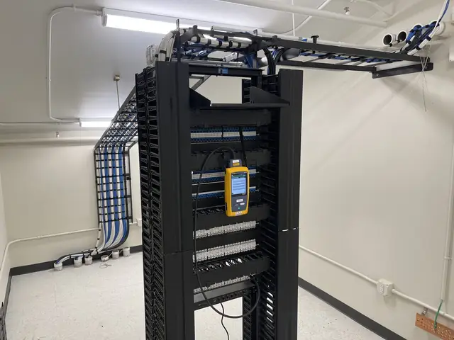 Fluke testing in a telecom room